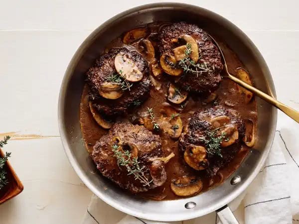 image 9336 - A divine dinner just ready to create a sense of awe and wonder on your taste buds? That's the Hallelujah Hamburger Steak in a nutshell! Each one of these tender, beefy, flavorful patties would impress on their own, but partnered with hearty mushrooms and a delicious, thick beef gravy? Well, that's nothing short of heavenly! Hallelujah Hamburger Steak certainly earns its wings!