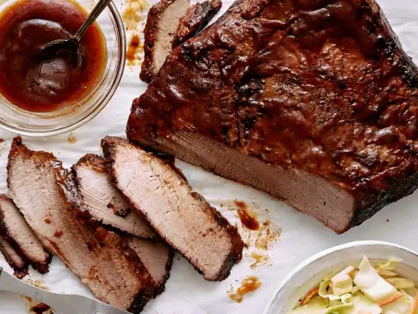 image 9788 - Brisket is a pillar of the barbeque tradition: an exceptional cut of beef grilled until truly tender. This is the Better BBQ Brisket. It's better. How much better? Well, it has delicious spices rubbed directly into the meat, so each bite is vibrant, warm, and zesty. It's coated in barbeque sauce, tangy and sweet. It will melt just in your mouth. This is the Better BBQ Brisket: you deserve something better than just common barbeque mains at your next cookout!
