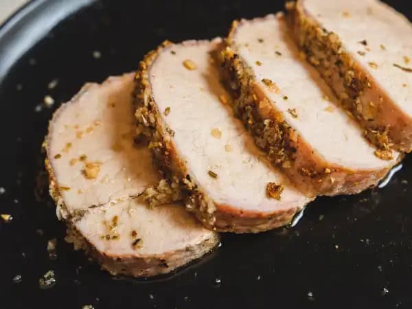 image 9809 - We hate to say it, but meat can really make or break a meal. Well, we've got good news for you. The always perfect Roasted Pork Loin will never let anyone down! It's impossible! The tenderness of the pork loin after taking it's time in the oven can't be topped. And you'll never forget how much enjoyment the rich and savory flavors of the garlic, rosemary, and white wine bring to the table every time. Only smiling faces and satisfied tummies will be sitting around your table after Roasted Pork Loin is served! You can always count on it!