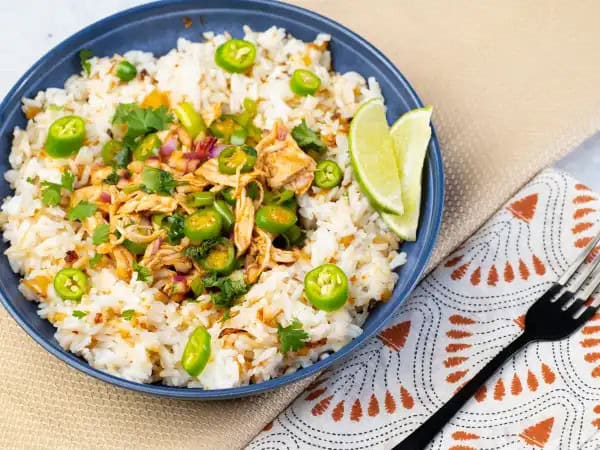 image 9831 - We're going on a journey, but you can keep your suitcases in the closet! Instead, grab your chopsticks and let's head to the kitchen for some of this Taste-of-Asia Rice. Each bite will take you on an adventure filled with fluffy rice, of course, but also perfectly seasoned chicken tossed in a spicy, tangy herb salad! Your taste buds won't believe what they're tasting is real! With a squeeze of lime, Taste-of-Asia Rice is a terrific trip for two worth taking! Come along!