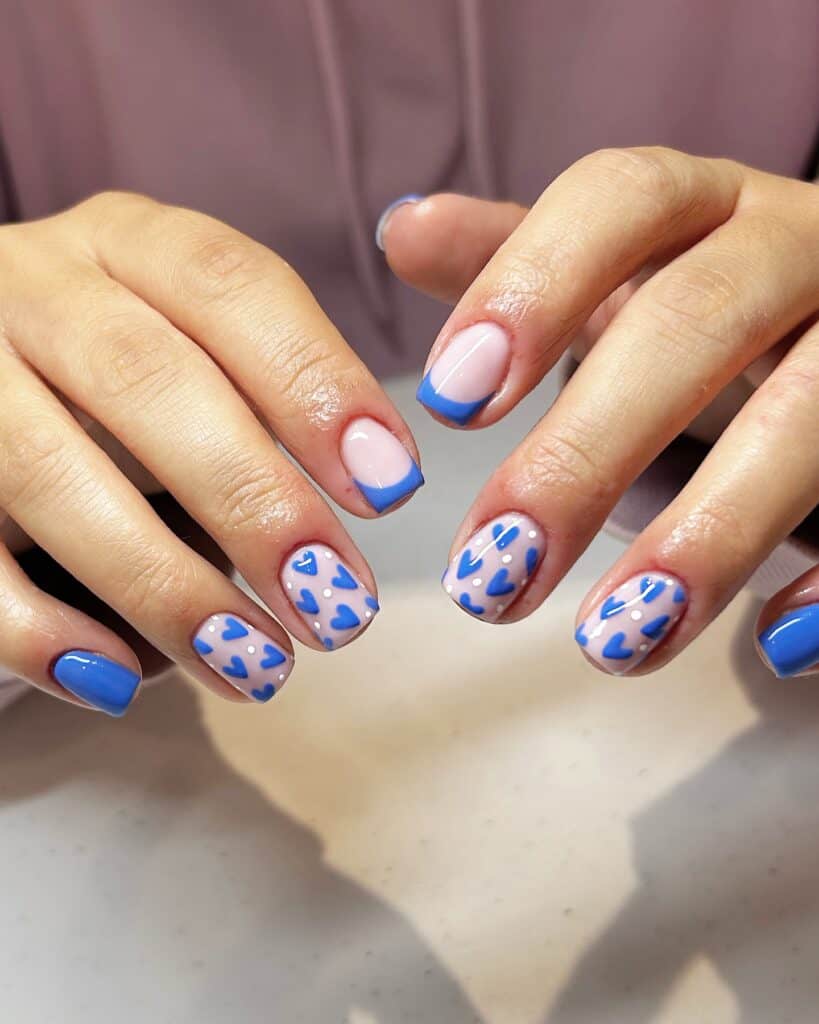 Varied blue nail designs showcasing light blue nails, royal blue acrylic nails, and blue French tips in different hand poses.