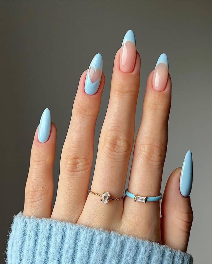 Varied blue nail designs showcasing light blue nails, royal blue acrylic nails, and blue French tips in different hand poses.