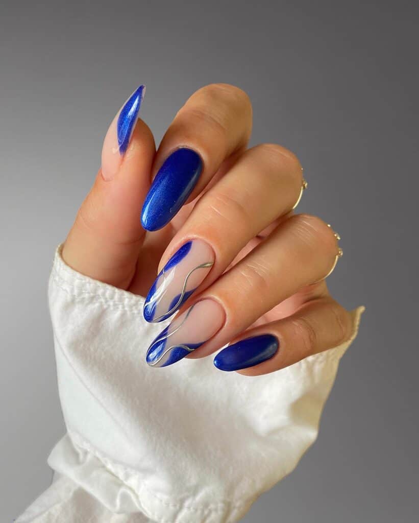 Varied blue nail designs showcasing light blue nails, royal blue acrylic nails, and blue French tips in different hand poses.