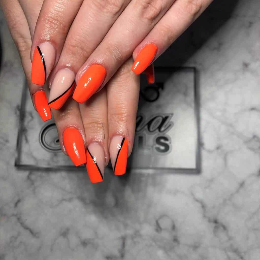 Chic summer nails featuring vibrant orange hues, from neon to burnt with glitter accents, perfect for adding a seasonal touch.