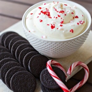 Candy Cane Cheesecake Dip HERO - Christmas parties are a cherished tradition, bringing together friends and family to celebrate the festive season. One of the highlights of these gatherings is undoubtedly the food, and no Christmas party is complete without a variety of delicious dips. These dips serve as the perfect appetizers, offering a delightful start to the holiday feast and setting the tone for an evening of joy and laughter.