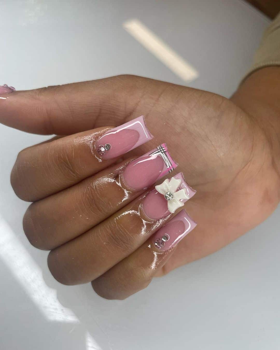 Pink Stone Floral Nails - When it comes to celebrating birthdays, every detail counts, and your nails are no exception. From vibrant confetti designs to elegant, understated patterns, the right nail art can add an extra layer of fun and flair to your special day. Whether you're planning a big bash or a quiet gathering, your nails can be a canvas for creativity, showcasing your personality and style.