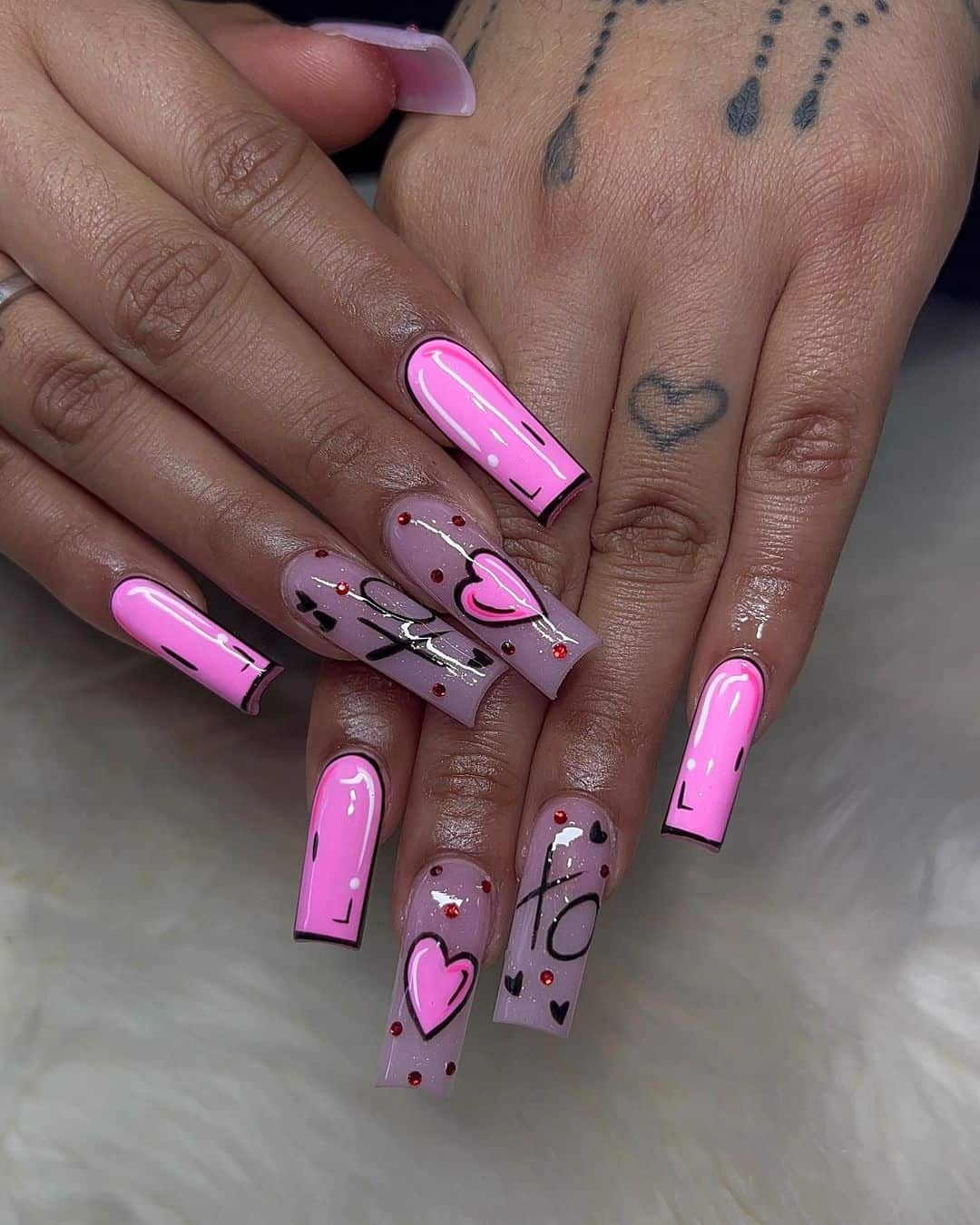 Pretty Pink XOXO Nails - When it comes to celebrating birthdays, every detail counts, and your nails are no exception. From vibrant confetti designs to elegant, understated patterns, the right nail art can add an extra layer of fun and flair to your special day. Whether you're planning a big bash or a quiet gathering, your nails can be a canvas for creativity, showcasing your personality and style.