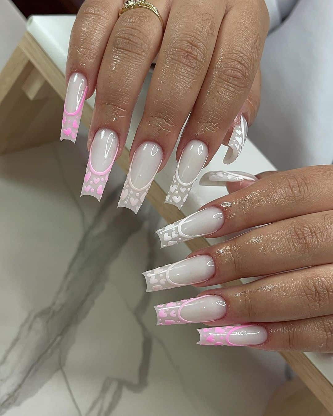 White Pink Heart Nails - When it comes to celebrating birthdays, every detail counts, and your nails are no exception. From vibrant confetti designs to elegant, understated patterns, the right nail art can add an extra layer of fun and flair to your special day. Whether you're planning a big bash or a quiet gathering, your nails can be a canvas for creativity, showcasing your personality and style.