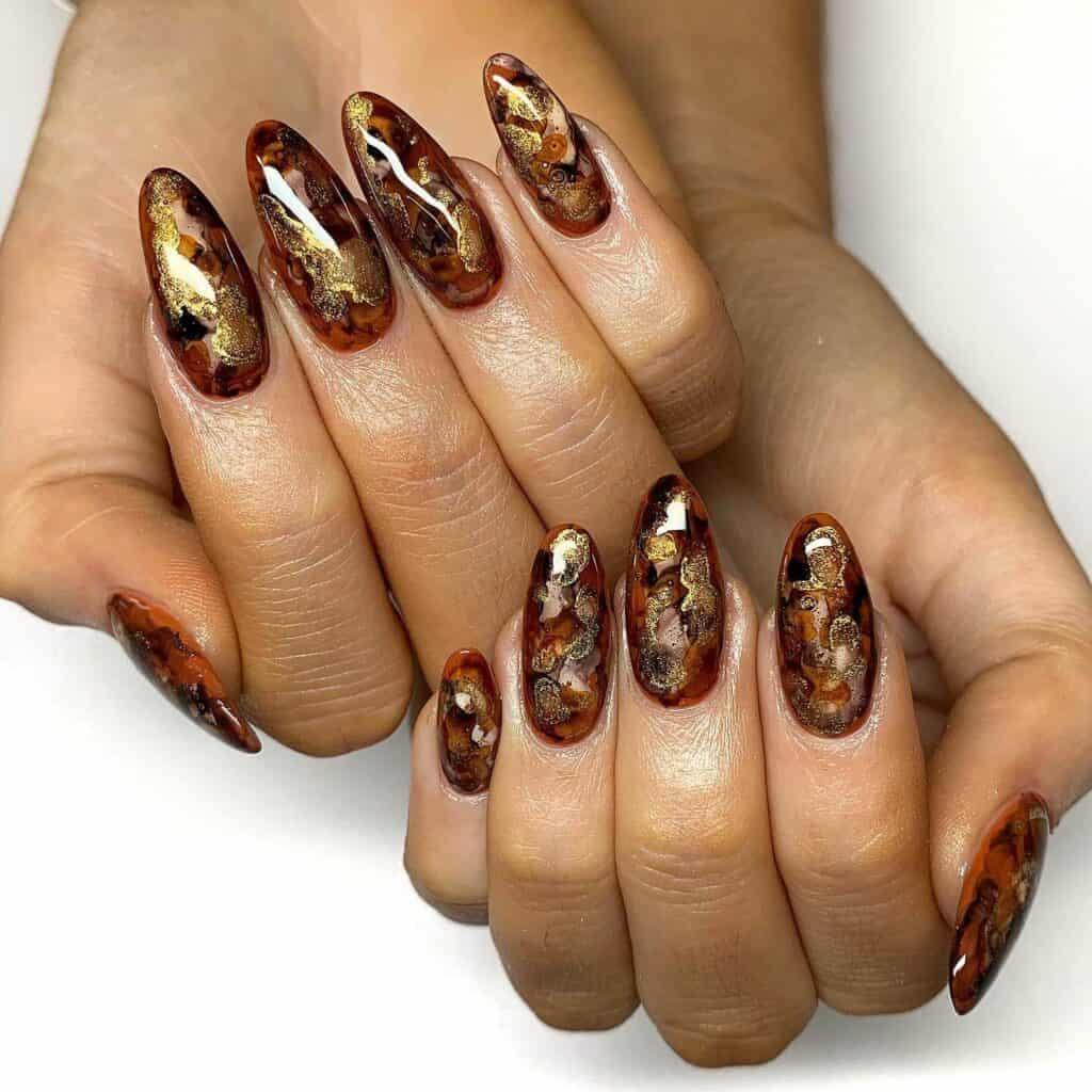 Discover the charm of amber nails with a variety of creative designs, from gel to acrylic styles. Find inspiration for your next manicure.