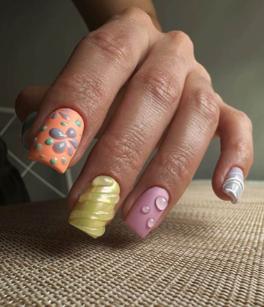 Detailed shot of festive nails showcasing candy cane stripes, lollipop swirls, and candy corn patterns in bright, vibrant hues.