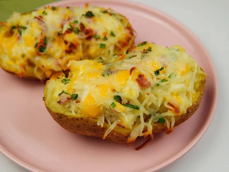 image 118 - Who could have guessed that baking potatoes twice would be the secret to making them perfect? Twice Baked Potato Skins has literally everything you could hope for in a potato: the exterior is crisp and crunchy, while the inside is fluffy and creamy. But then it goes for bonus points: tangy sour cream, succulent bacon, and melty cheese, both in the smooth mashed potato filling and on top! Twice Baked Potato Skins constantly make head-turning appearances at the local sports bars, but now they'll be wowing you from the comfort of your own home!