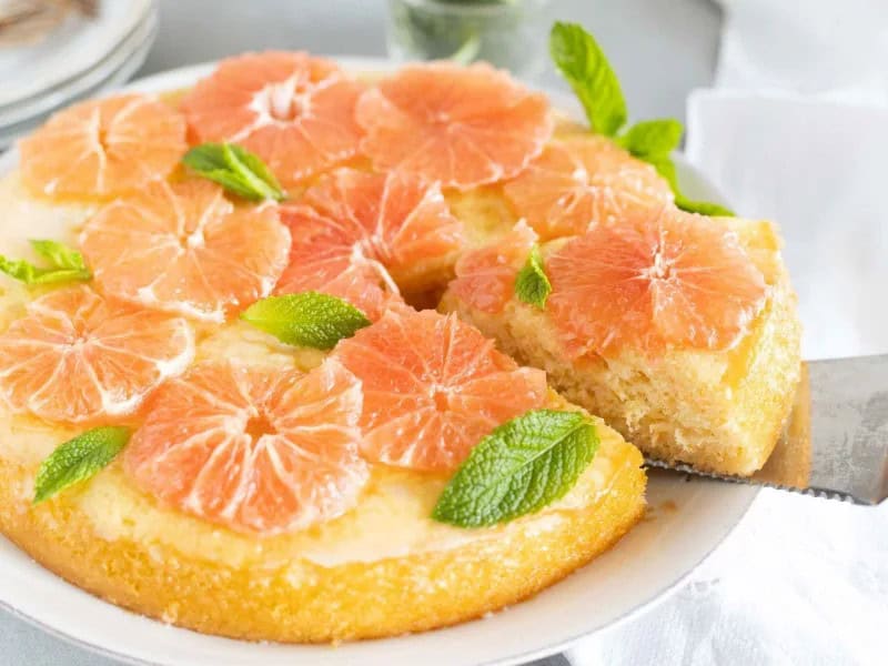 image 249 72 - The challenge with grapefruit is how to make its intense sour flavor more appealing. Grapefruit Cake decides that the best way to do so is by making a one-of-a-kind dessert! The tender, moist cake is tangy and sweet, balancing out the unique citrus flavor of the grapefruit. Drizzled on top is a glaze bursting with even more grapefruit taste and adding to the majesty of this magical treat. Grapefruit Cake is a summertime sensation you'll want to make all year round!