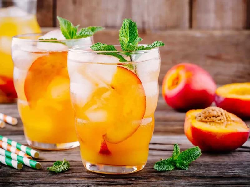 image 825 - Things really are peachy keen with some Peachy Keen Lemonade in hand! The brightness and summery sparkle of lemonade get the Southern treatment with an infusion of sweet and floral peach flavor. This is the kind of cold drink that demands you enjoy it on the patio in the sun or at a picnic with friends: Peachy Keen Lemonade is an essential part of enjoying the season. So get your favorite glass and get to relaxing!