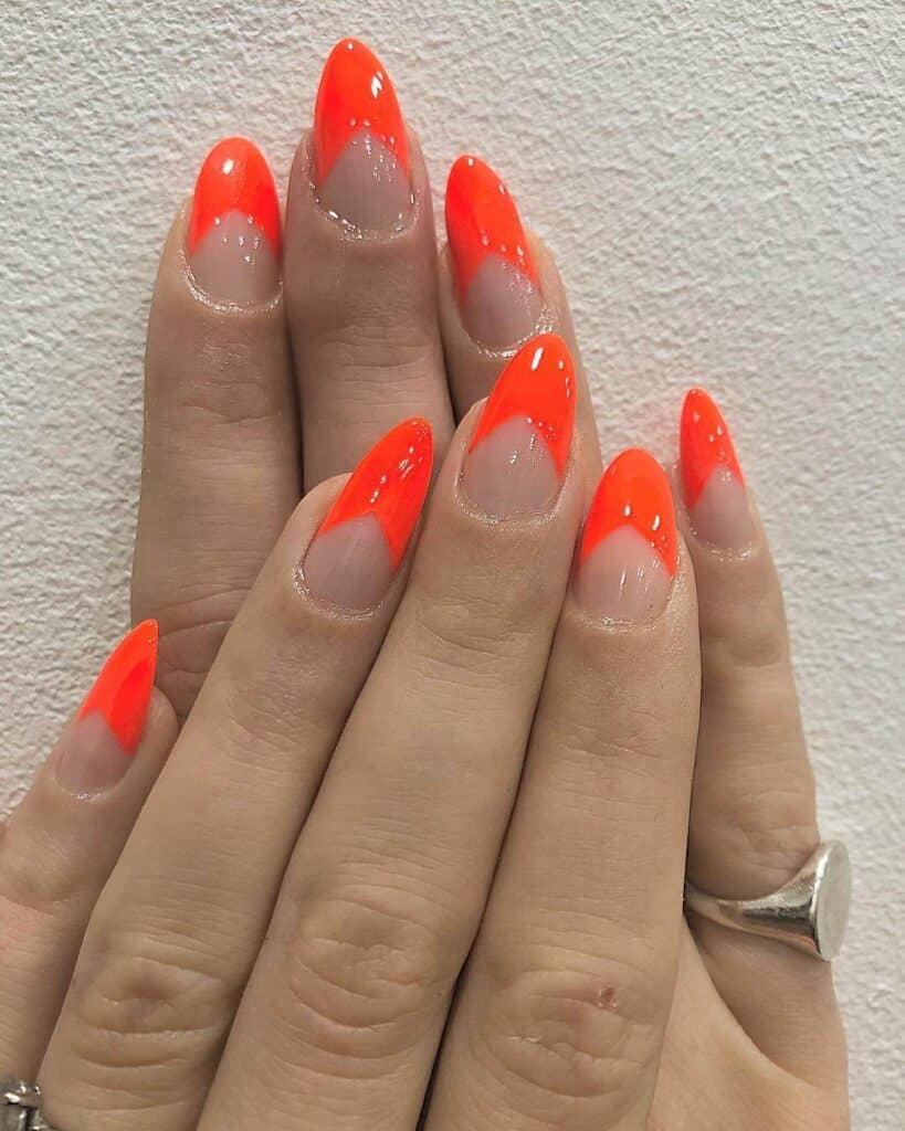 Radiant and lively neon nails featuring fashionable summer designs.