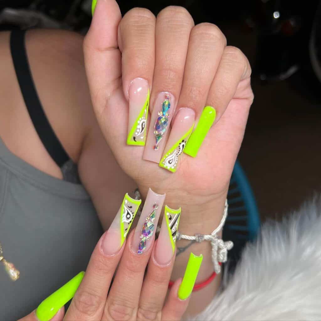 Radiant and lively neon nails featuring fashionable summer designs.