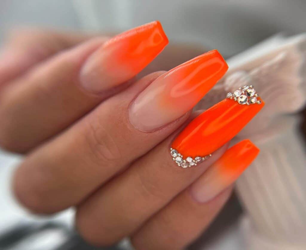 Radiant and lively neon nails featuring fashionable summer designs.