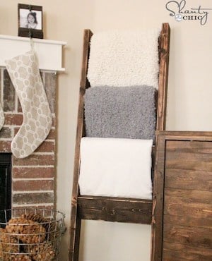 DIY Quilt Ladder1 - DIY Farmhouse Furniture Ideas bring a rustic charm to any home, making it both inviting and stylish. Whether you’re looking to revamp your living space or add a touch of vintage elegance, farmhouse furniture projects offer a unique blend of functionality and beauty.