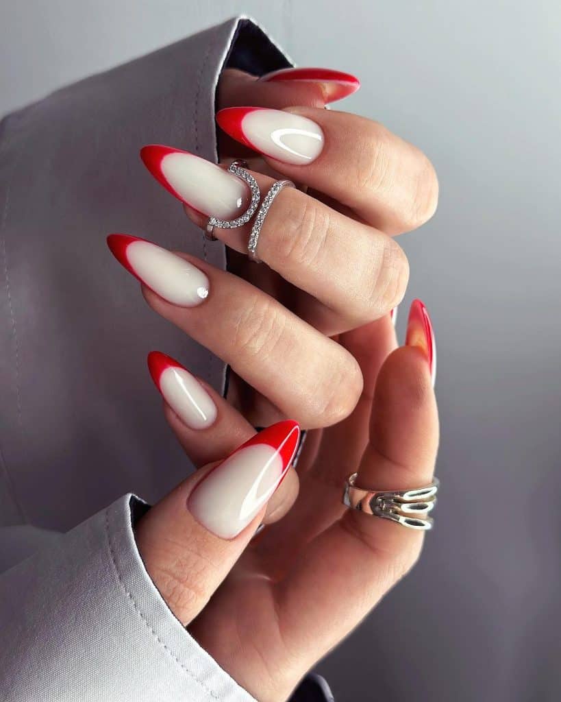 14 11 - Vivid red nails have long been a staple in the world of fashion and beauty, capturing attention with their bold and striking appeal. Whether you're preparing for a special occasion or simply want to make a statement, these red nail ideas will inspire your next salon visit or DIY manicure.