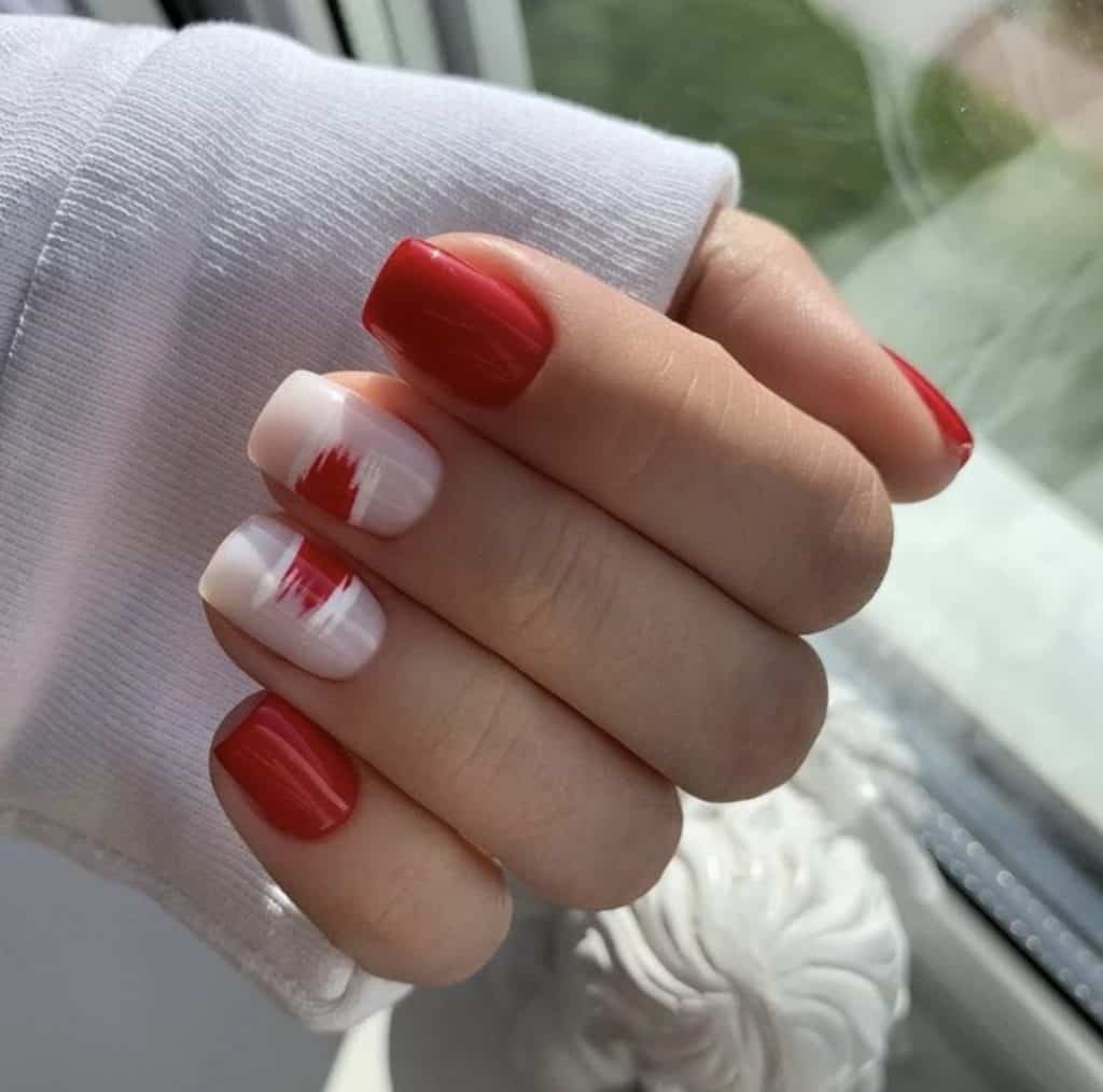 16 13 - Vivid red nails have long been a staple in the world of fashion and beauty, capturing attention with their bold and striking appeal. Whether you're preparing for a special occasion or simply want to make a statement, these red nail ideas will inspire your next salon visit or DIY manicure.