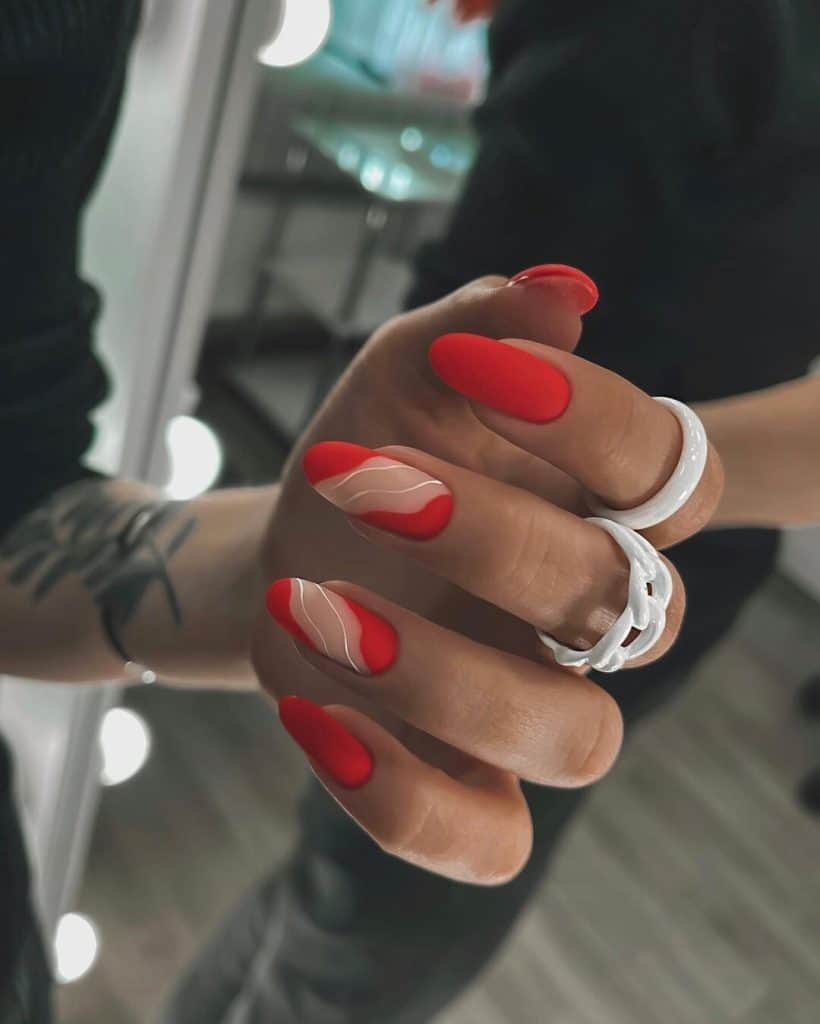 21 12 - Vivid red nails have long been a staple in the world of fashion and beauty, capturing attention with their bold and striking appeal. Whether you're preparing for a special occasion or simply want to make a statement, these red nail ideas will inspire your next salon visit or DIY manicure.