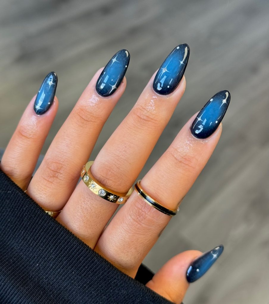 00008 Chrome Winter Nails - Chrome winter nails bring a sleek, icy touch to cold-weather manicures. Whether you're drawn to silver chrome winter nails, frosty blues, or pearlescent whites, these high-shine designs capture the magic of the season. From metallic chrome winter nail ideas with a mirror finish to soft, iridescent hues that reflect the snow-covered landscape, there are endless ways to achieve a stylish, frosty look.