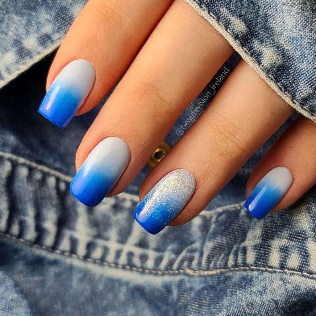 00004 Blue Ombre Nails - I always felt drawn to classy blue ombre nail ideas because the blend of elegance and boldness just feels so right. Whether it was for weddings, brunches or just to make errands feel prettier, blue ombre nails gives me a confidence like no other.