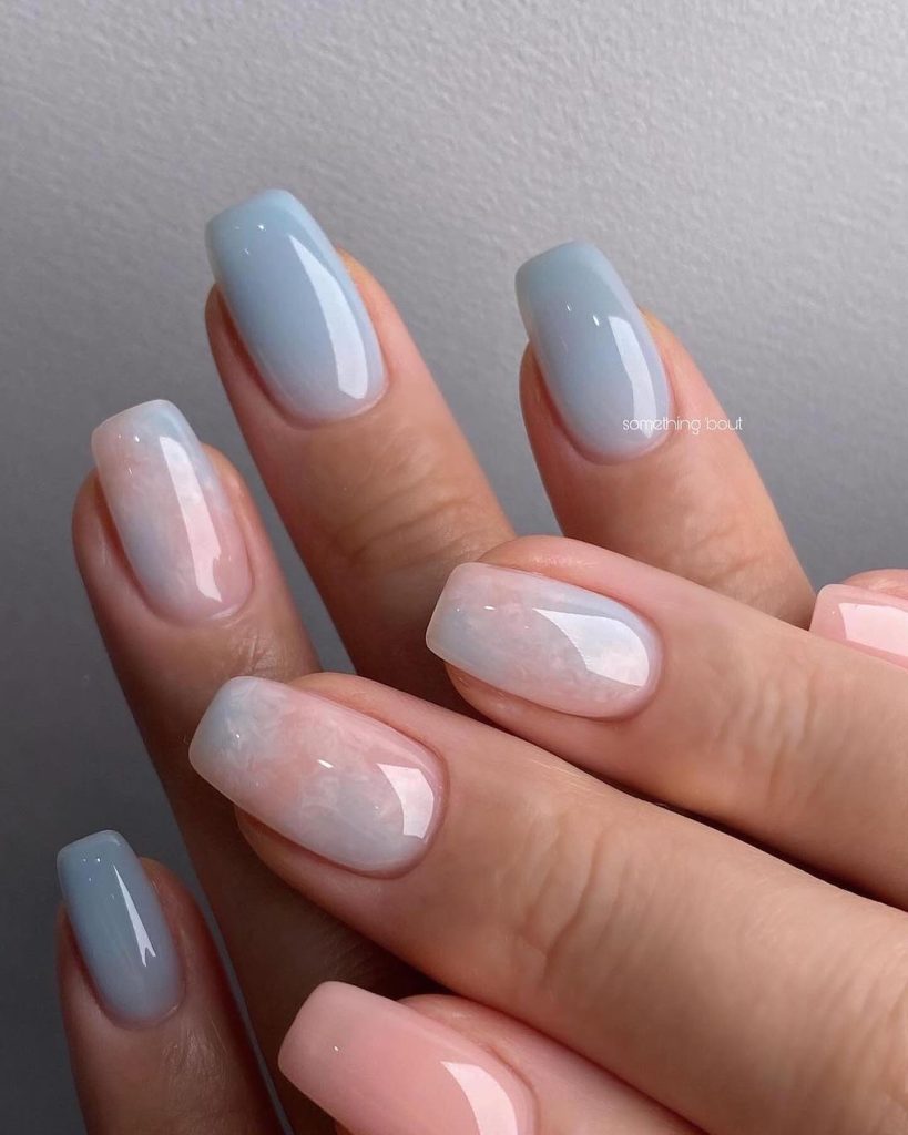 00007 Blue Ombre Nails - I always felt drawn to classy blue ombre nail ideas because the blend of elegance and boldness just feels so right. Whether it was for weddings, brunches or just to make errands feel prettier, blue ombre nails gives me a confidence like no other.