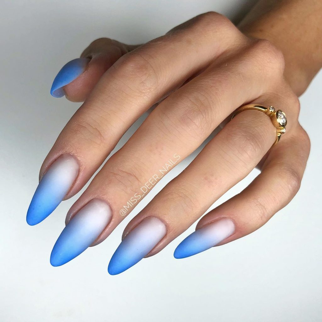 00008 Blue Ombre Nails - I always felt drawn to classy blue ombre nail ideas because the blend of elegance and boldness just feels so right. Whether it was for weddings, brunches or just to make errands feel prettier, blue ombre nails gives me a confidence like no other.