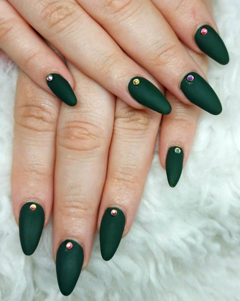00015 Matte Green Nails - I’ve always loved experimenting with nail colors, but nothing feels quite like chic matte green nail ideas during the cooler months. The first time I tried matte green nails, I was going for something simple but what happened was—everyone noticed it, even strangers.